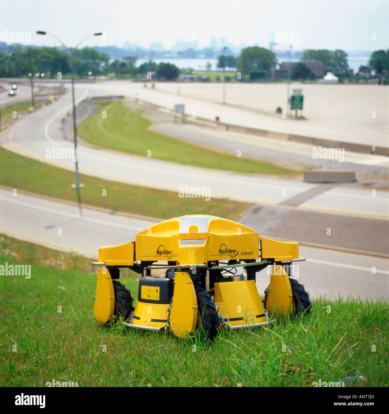 A remote control industrial grass cutter near the Peace Bridge Fort Erie Ontario Canada Stock Photo
