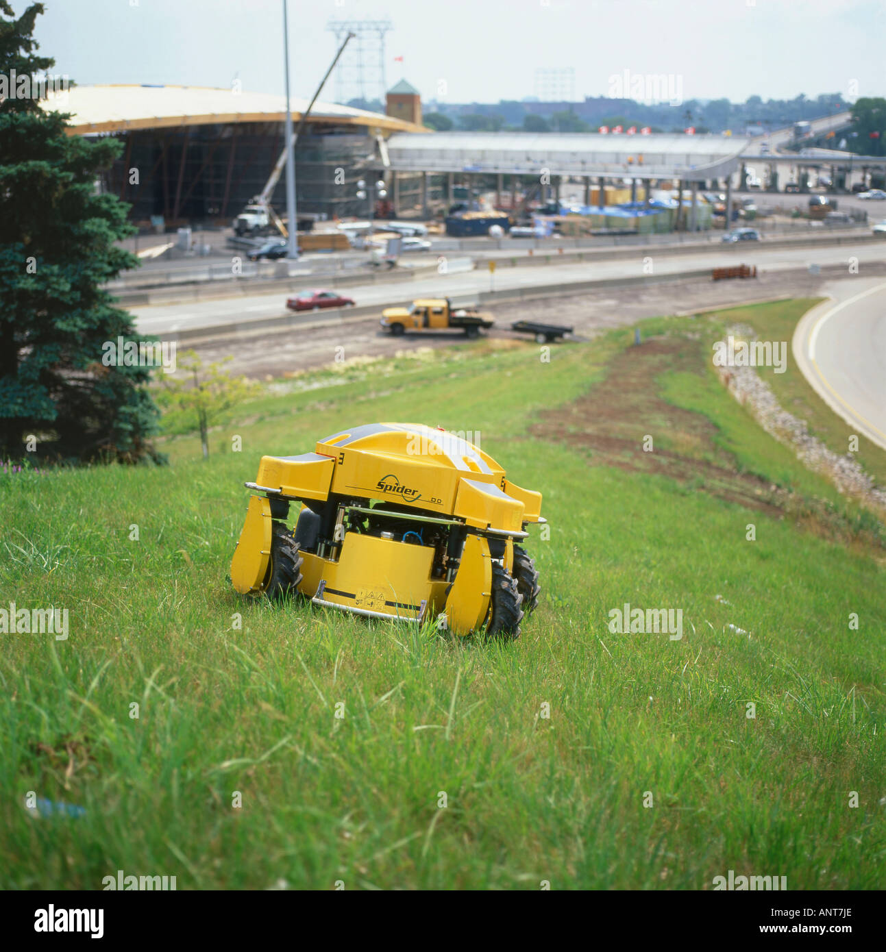 A remote control industrial grass cutter near the Peace Bridge Fort Erie  Ontario Canada Stock Photo - Alamy