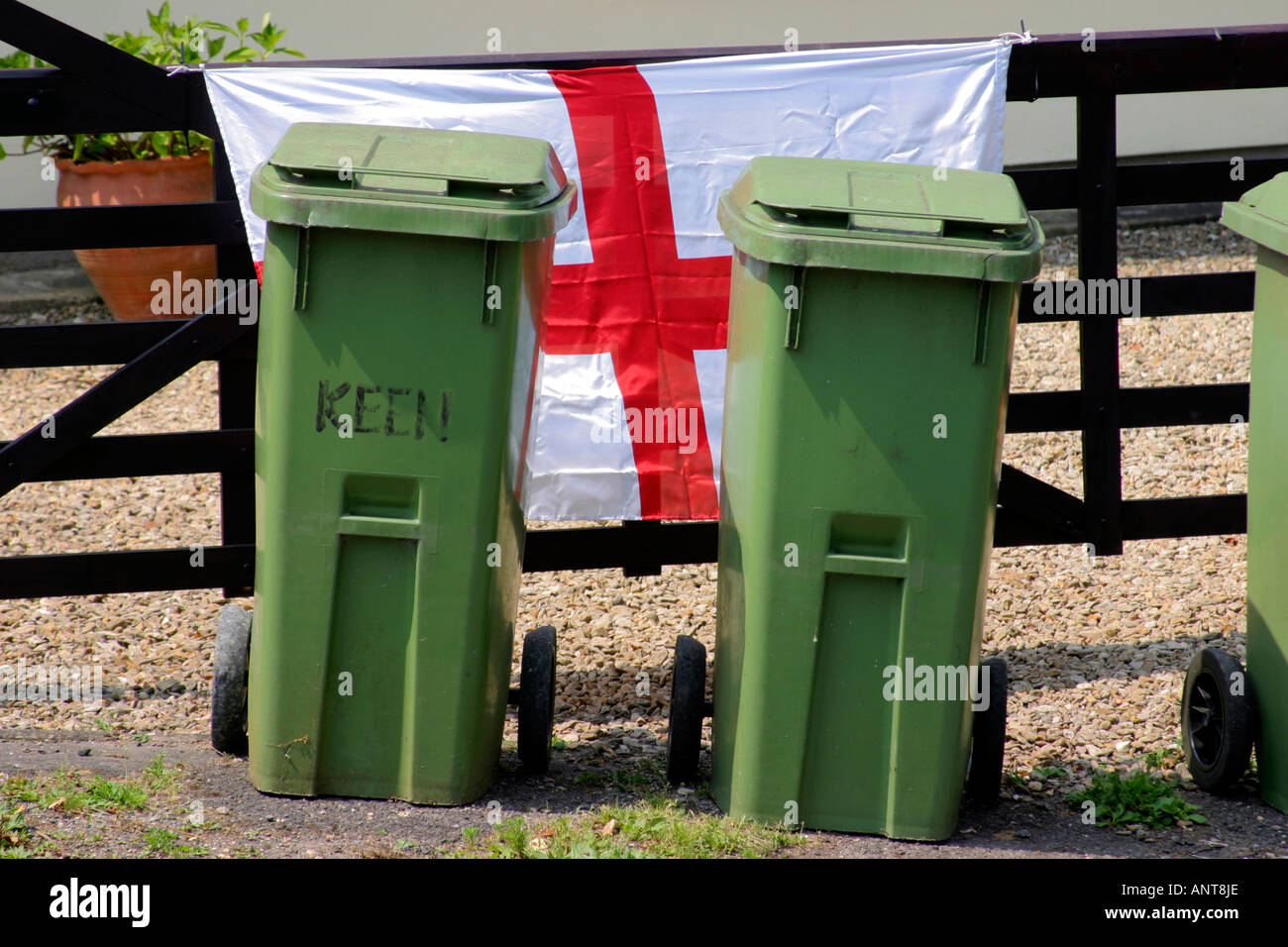 England flag next to rubbish bins outside house during 2006 football world cup Stock Photo Alamy