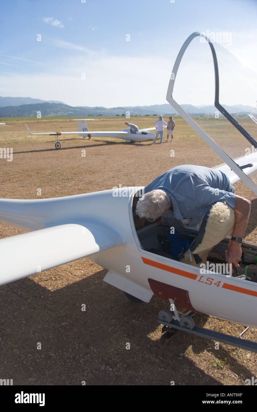 pilot prepares a glider for transport in Santa Ynez Valley Gliderport Santa Ynez Valley near Santa Barbara California Stock Photo