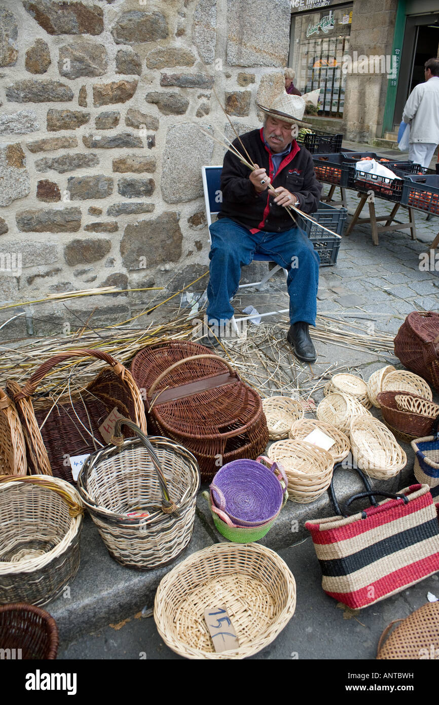 basket weaver at market in Dinan, Cotes d'Amour, Brittany, France Stock  Photo - Alamy