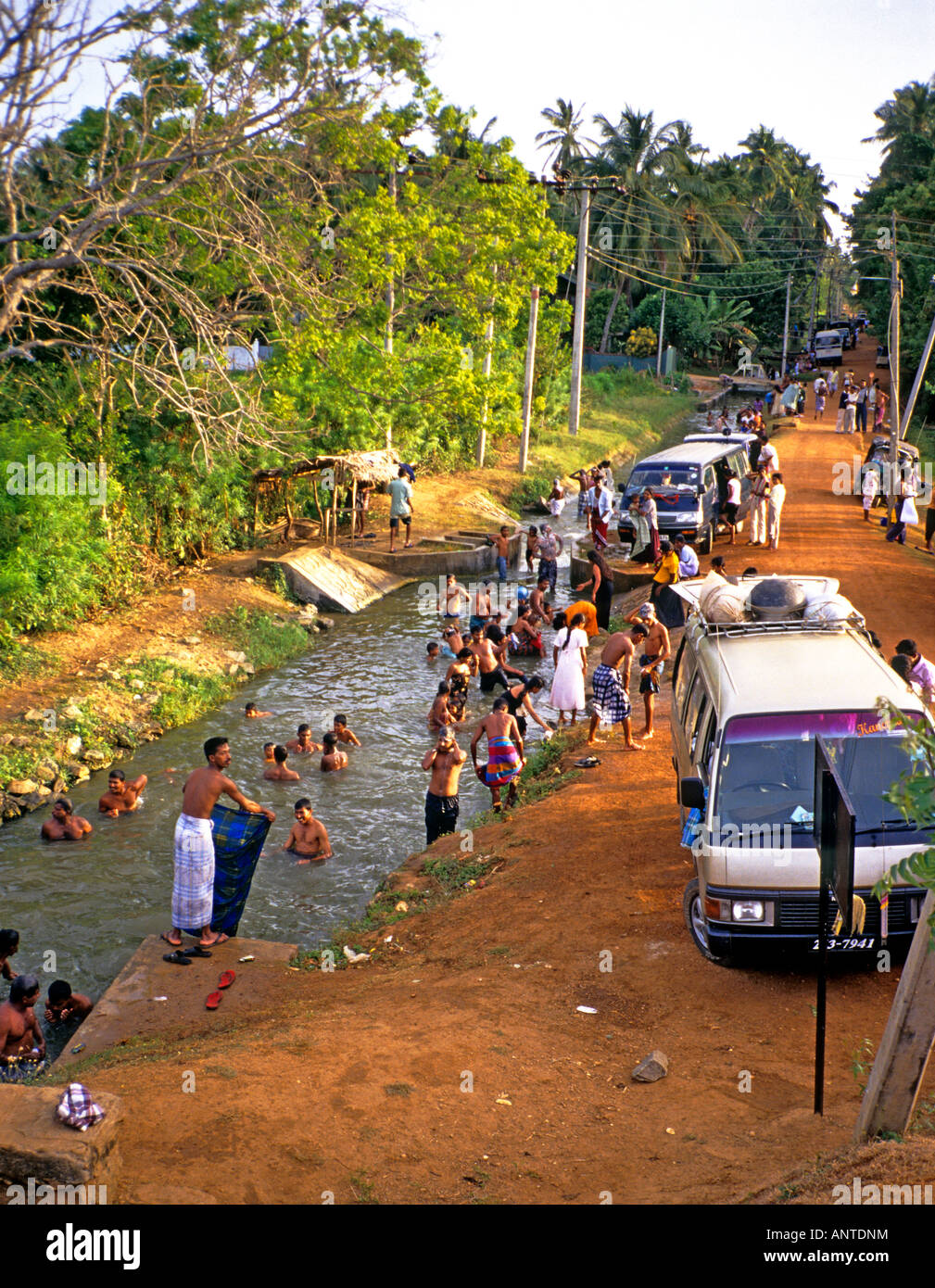 sri-lancan-families-bathing-in-a-small-river-in-southern-sri-lanka-ANTDNM.jpg