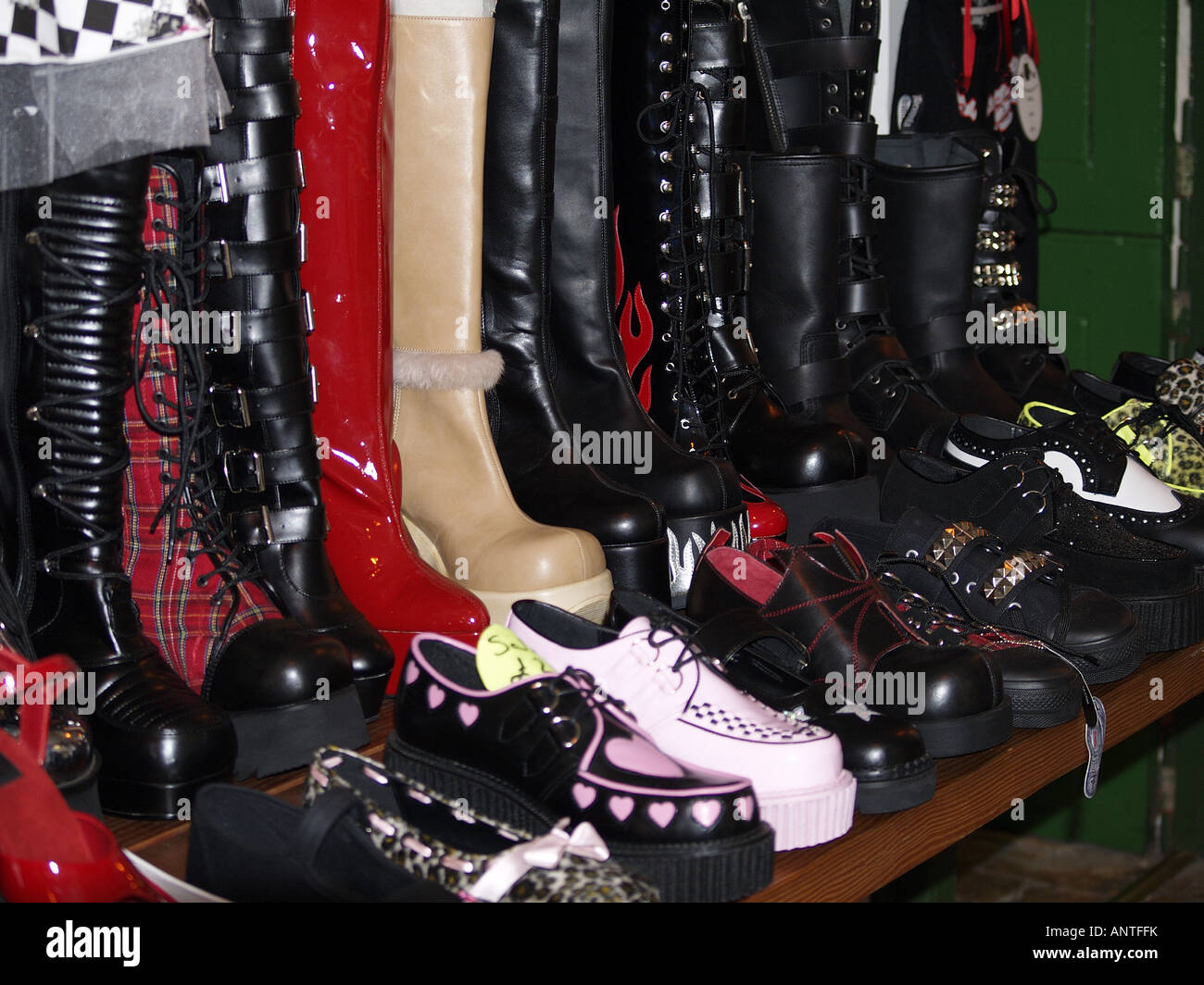 display of footwear for Gothics and rockers outside small shop, Bideford, Devon Stock Photo