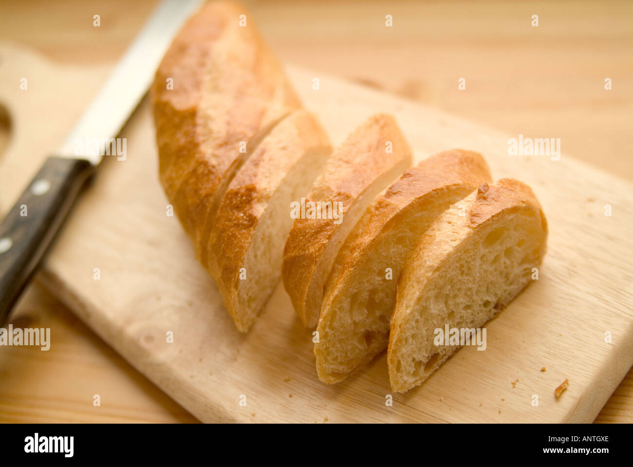 Cut bread on cutting board Stock Photo