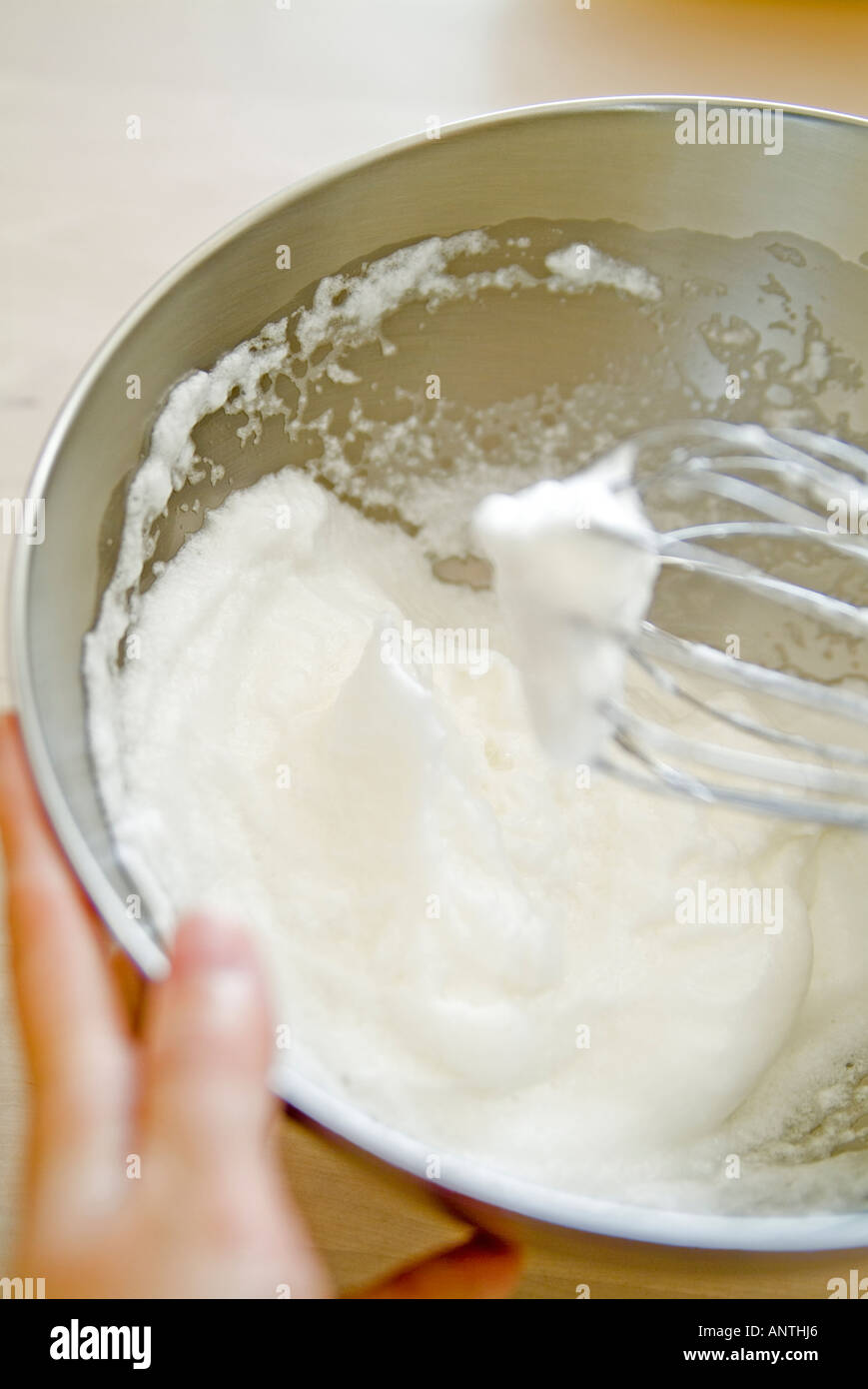 Whisking egg white Stock Photo Alamy