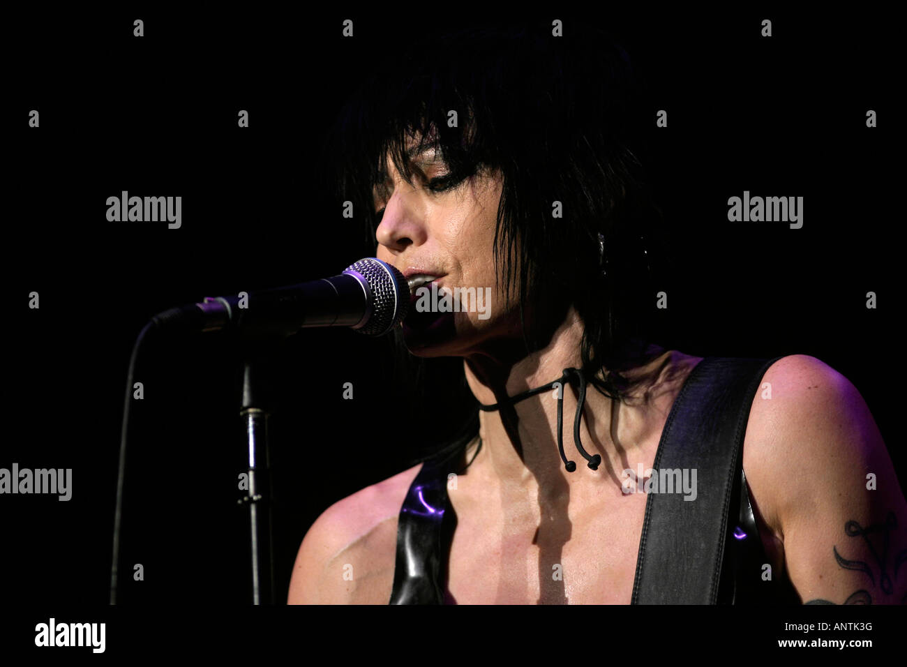 Joan Jett lead singer of Joan Jett And The Blackhearts playing the