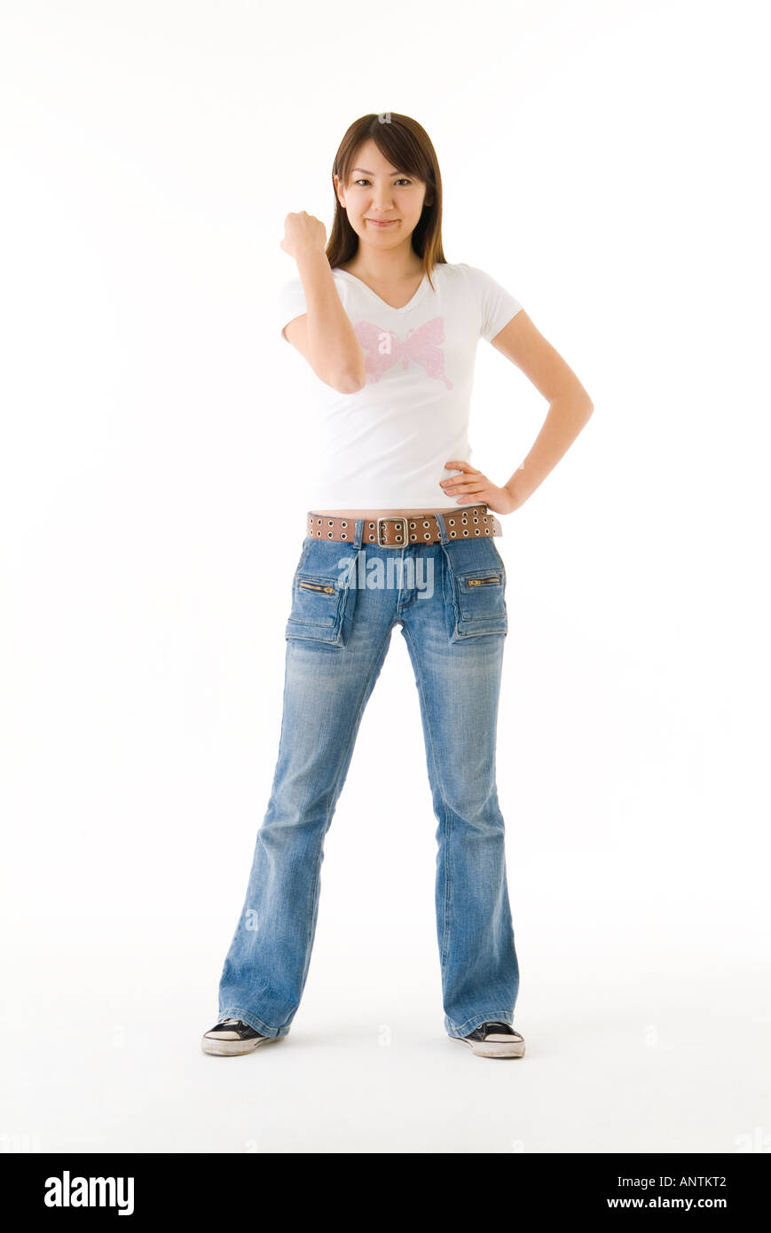 Young woman standing Stock Photo - Alamy