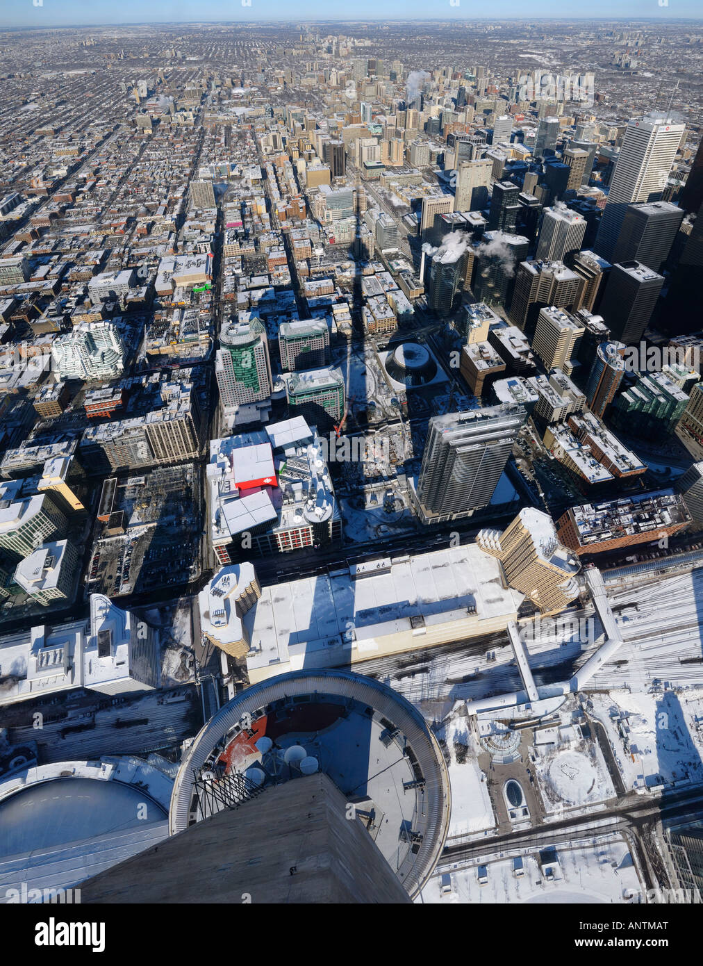 Birds eye view of downtown highrises and Toronto North from the CN Tower with shadow in winter Stock Photo
