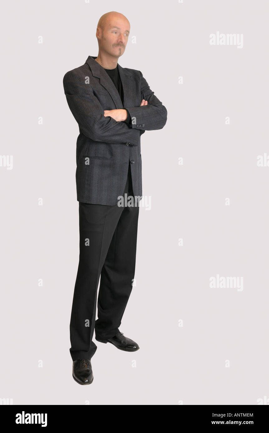 Cutout of man with nylon stocking over head in jacket standing with arms crossed Stock Photo