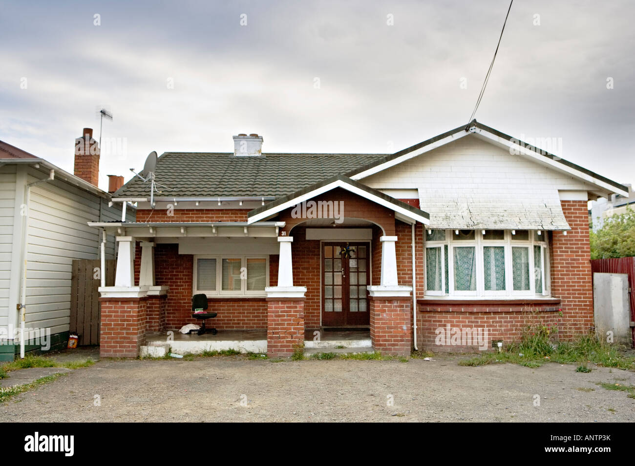 Urban landscape Palmerston North New Zealand Typical NZ brick and tile house of the sort that