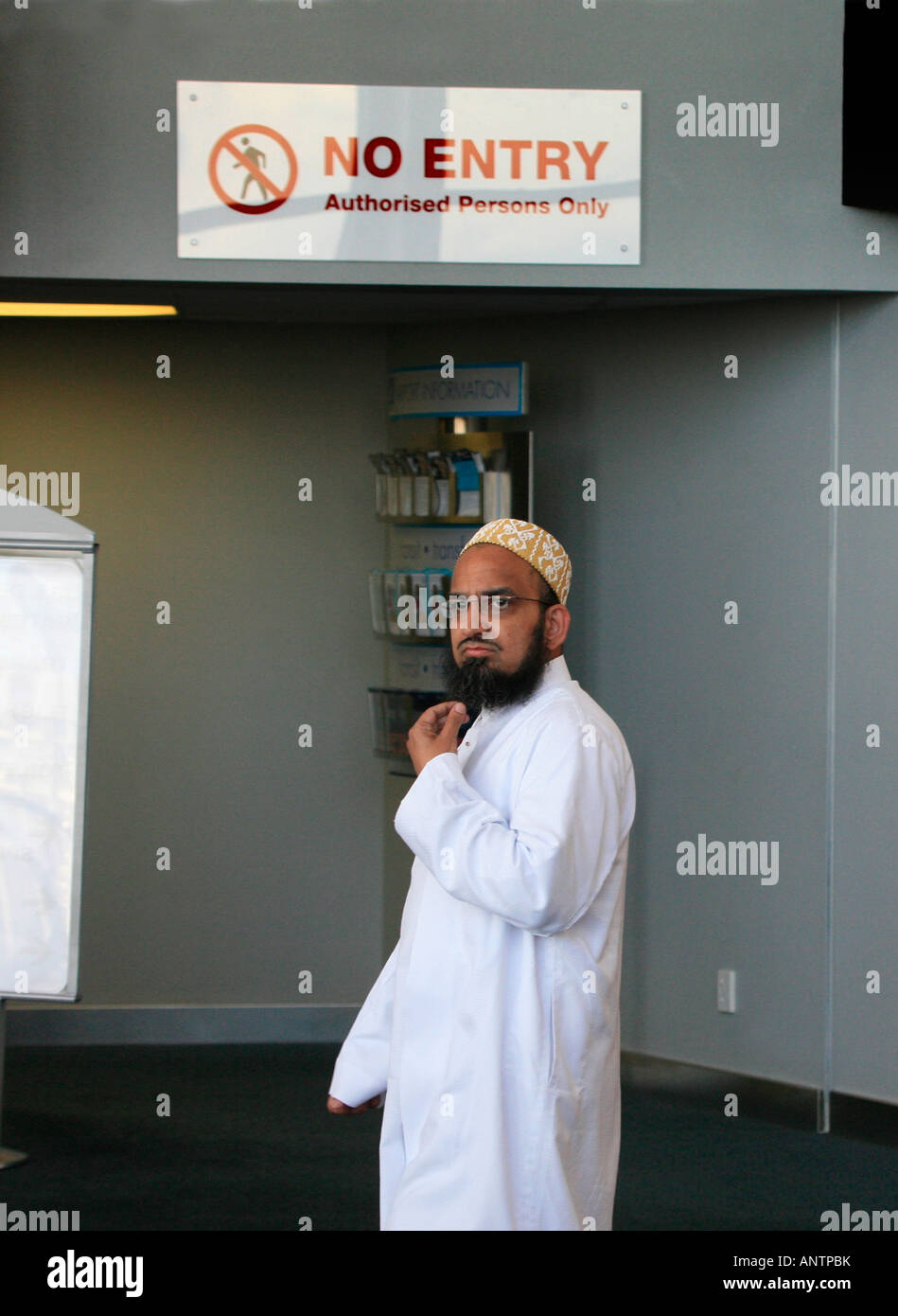 Muslim man at airport Stock Photo