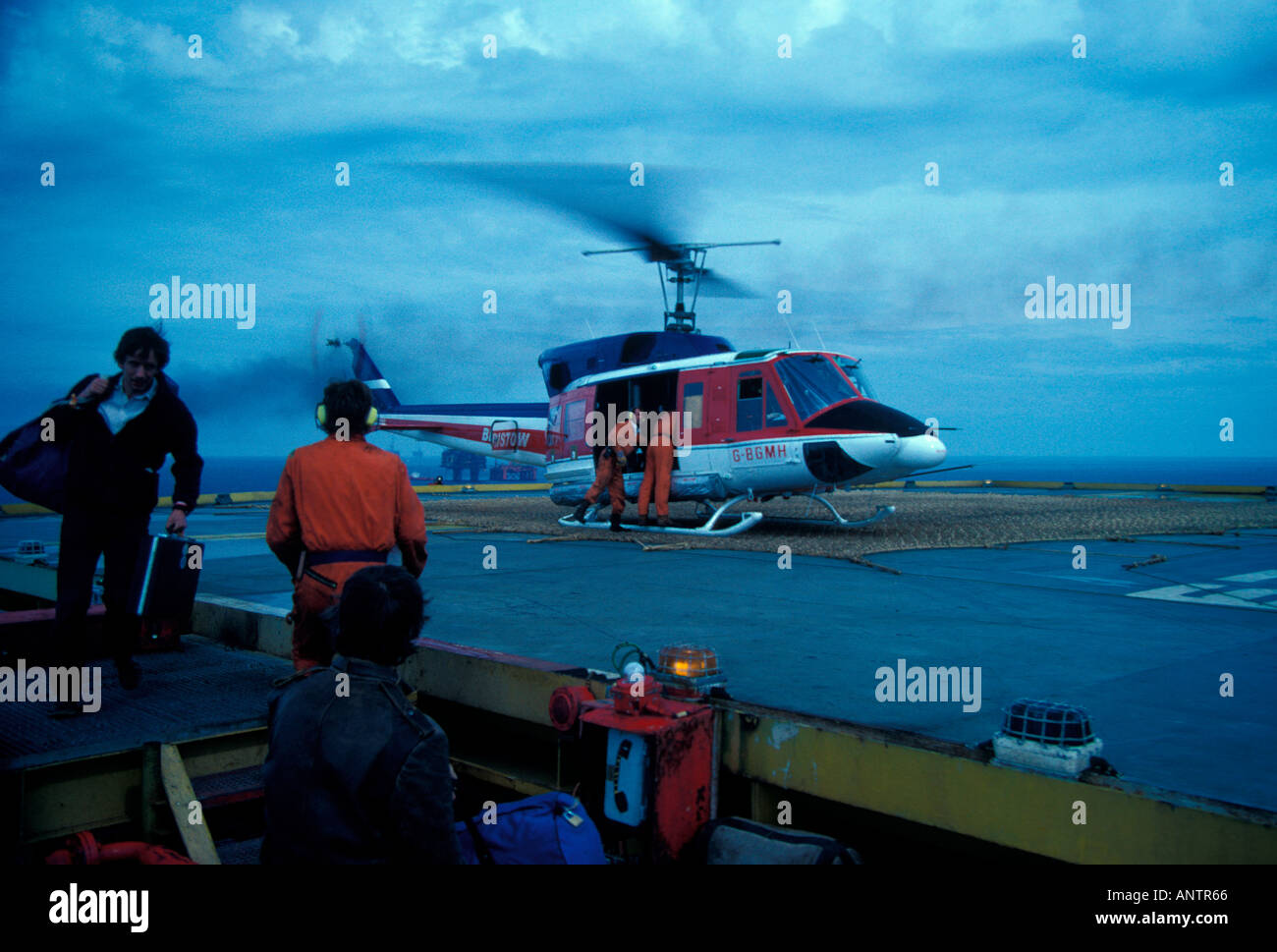 North Sea helicopter lands on Brent Alpha oil rig Stock Photo