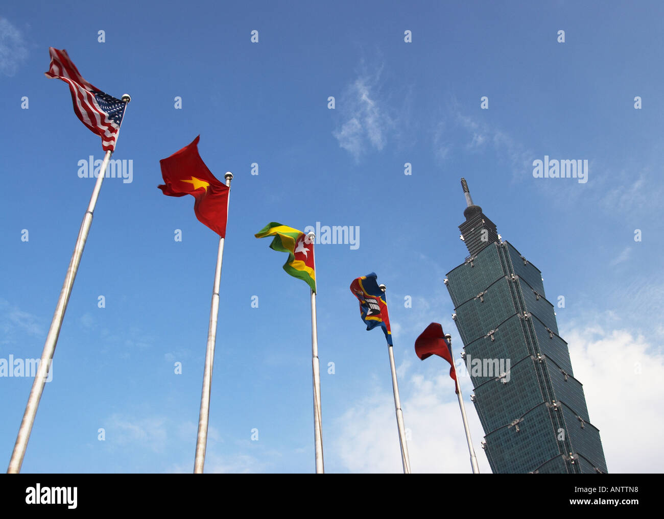 Taiwan, Flags Flying Outside Taipei 101 Stock Photo