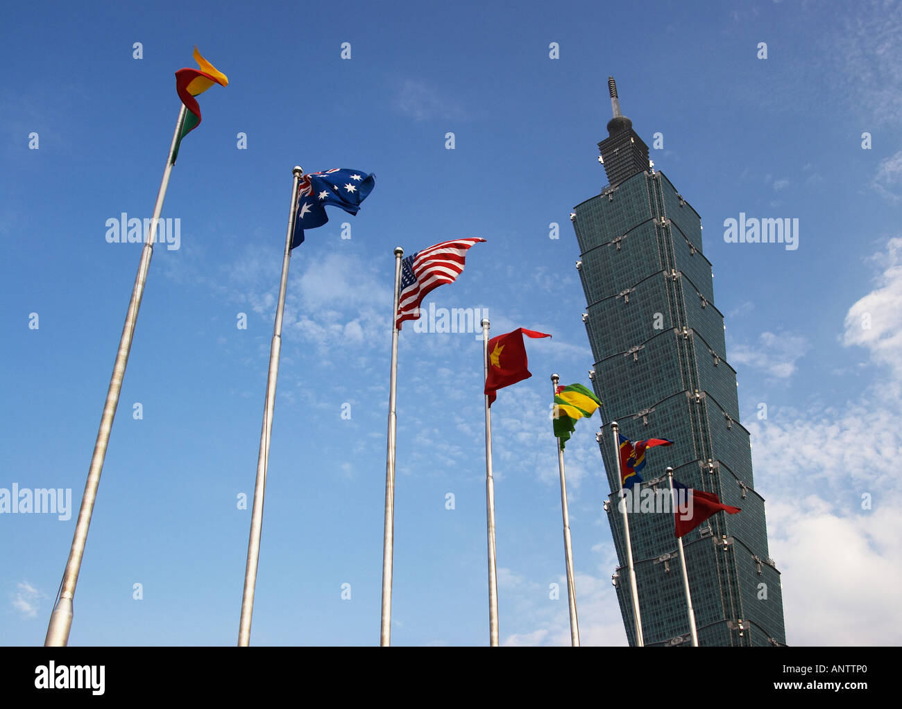 Flags Flying Outside World's Former Tallest Building, Taipei 101 Stock Photo