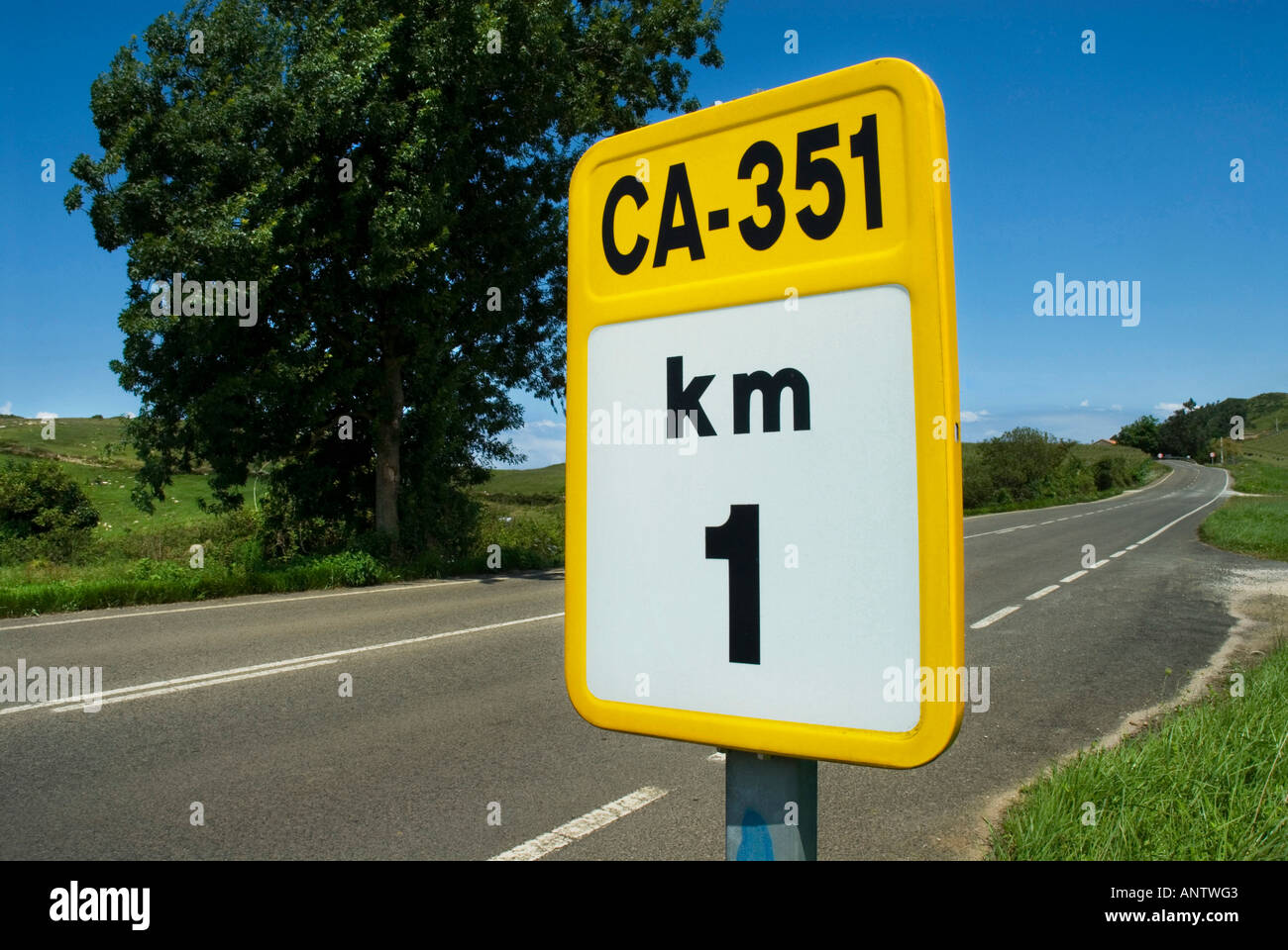 TRAFFIC SIGN INDICATE INFORMATION OF CANTABRIA ROAD KM 1 ON ROAD AND SKY BACKGROUND Stock Photo