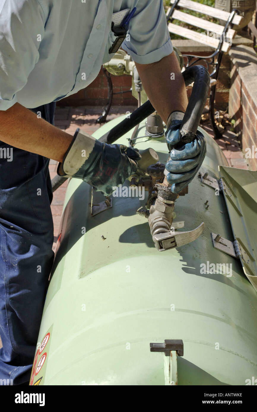 Making the connection between Calor Gas tanker and the domestic tank. Stock Photo