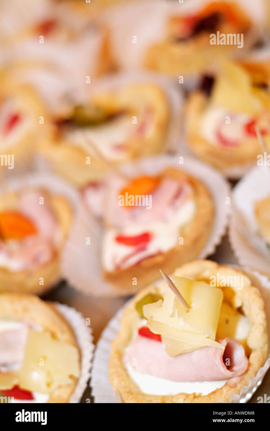 Appetizers Made with Cheese and Ham Served in a Pastry Cup with Cottage Cheese and Garnished with Sliced Peppers Stock Photo