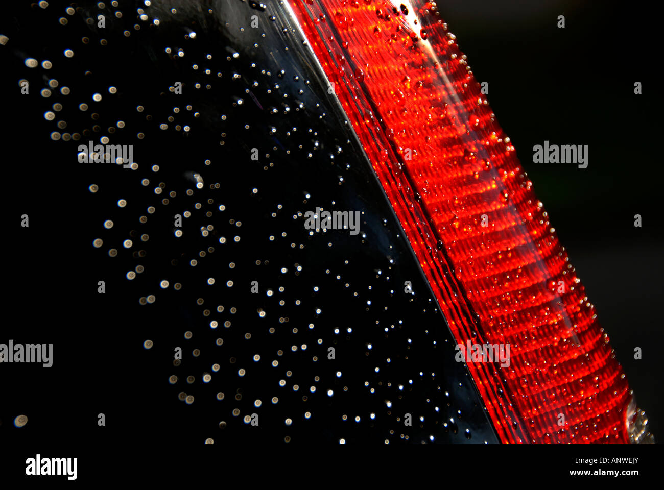 Abstract image of a tail light on a Volvo car. Stock Photo