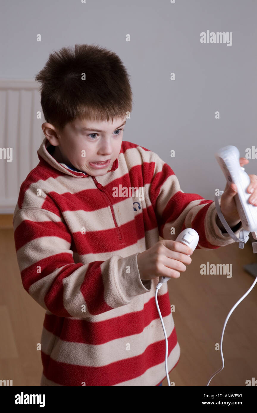 Boy Playing With Nintendo Wii Stock Photo