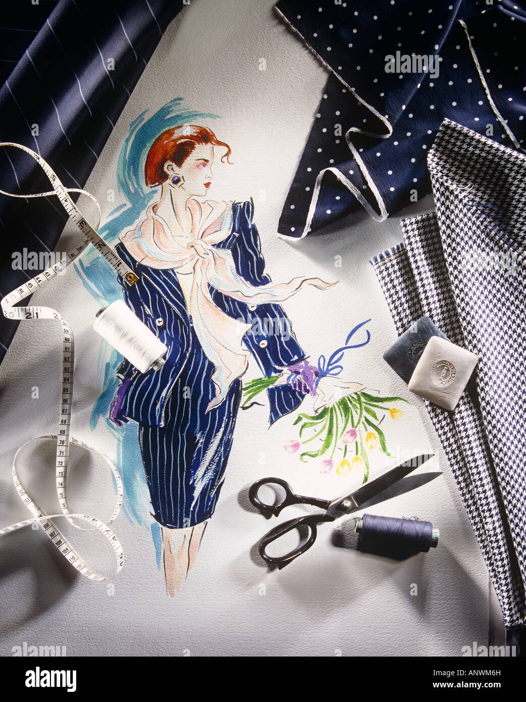 Female Fashion Drawing With Seamstress Materials Stock Photo