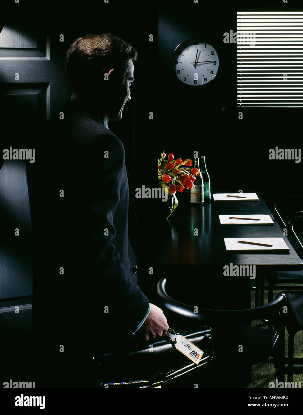 Man arriving punctually/promptly/early for business meeting Stock Photo