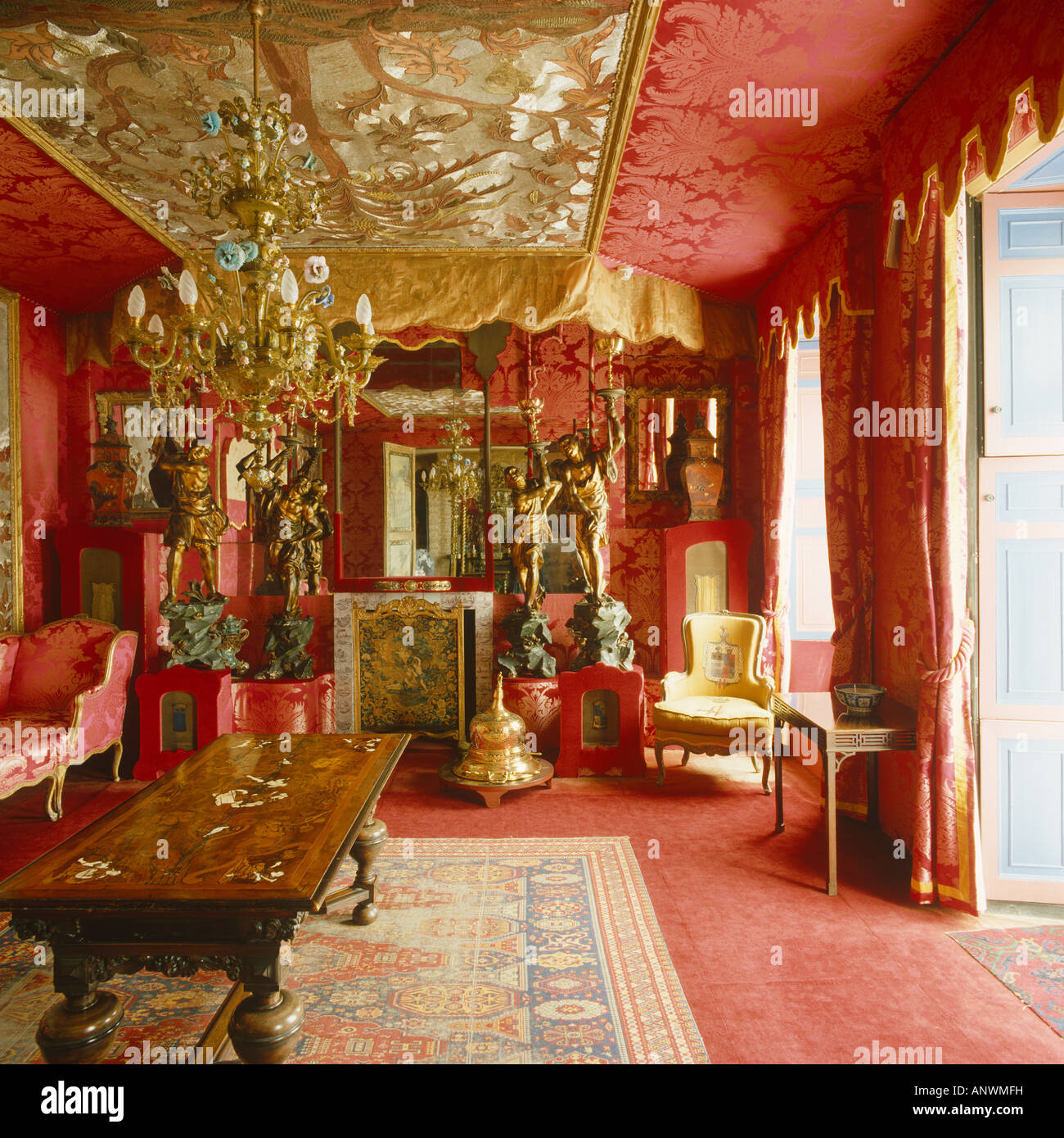 Victor Hugo red sitting room interior in Hauteville House Guernsey Stock Photo