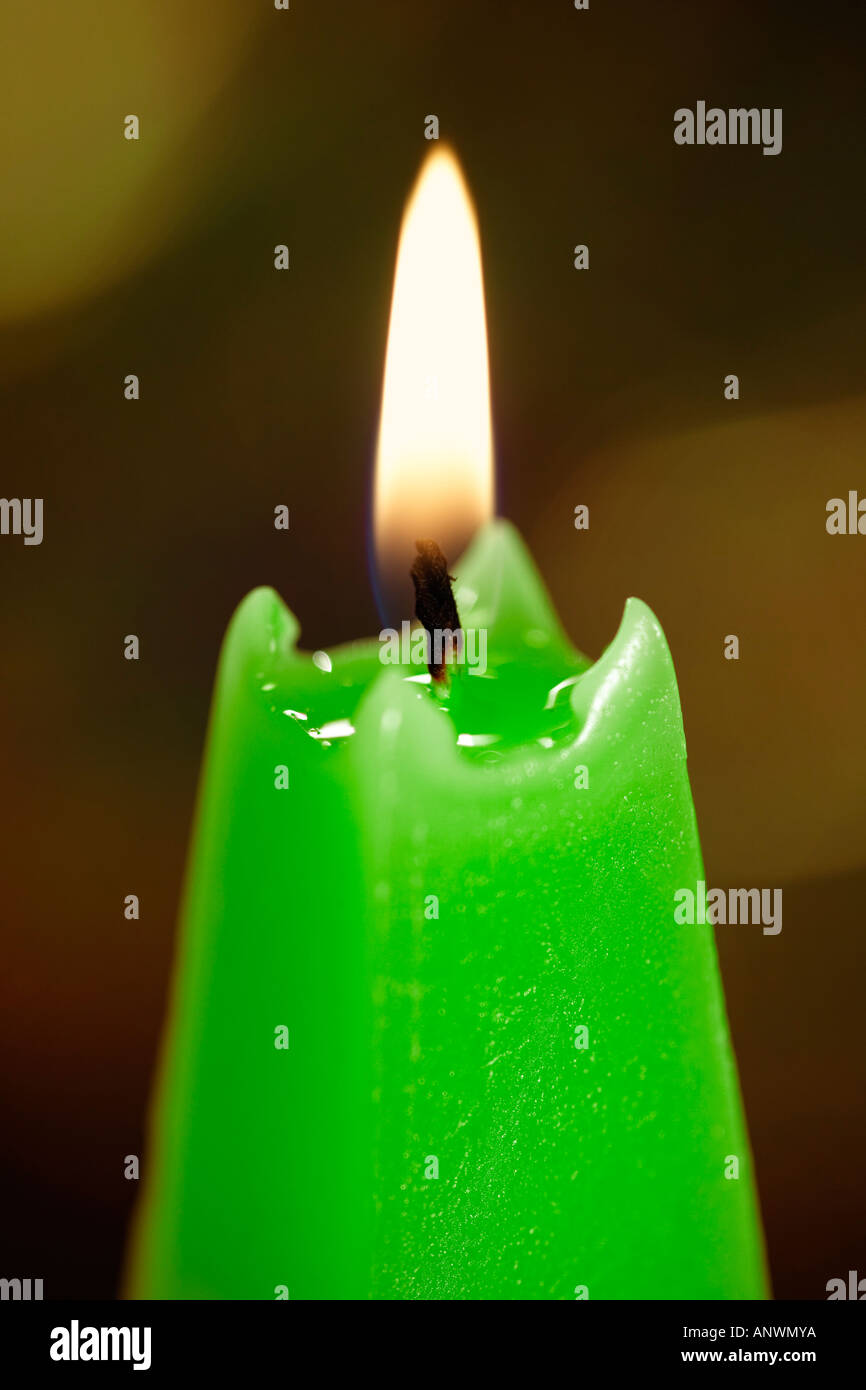Burning green candle Stock Photo Alamy