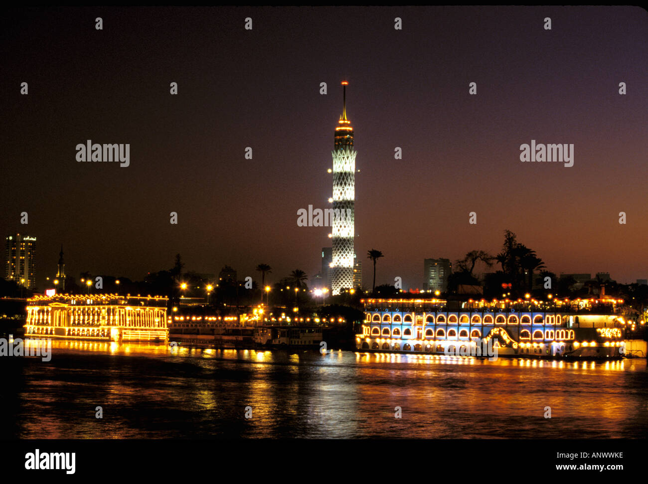 Africa, Egypt, Cairo. Evening view of Cairo Tower from Nile River Stock ...