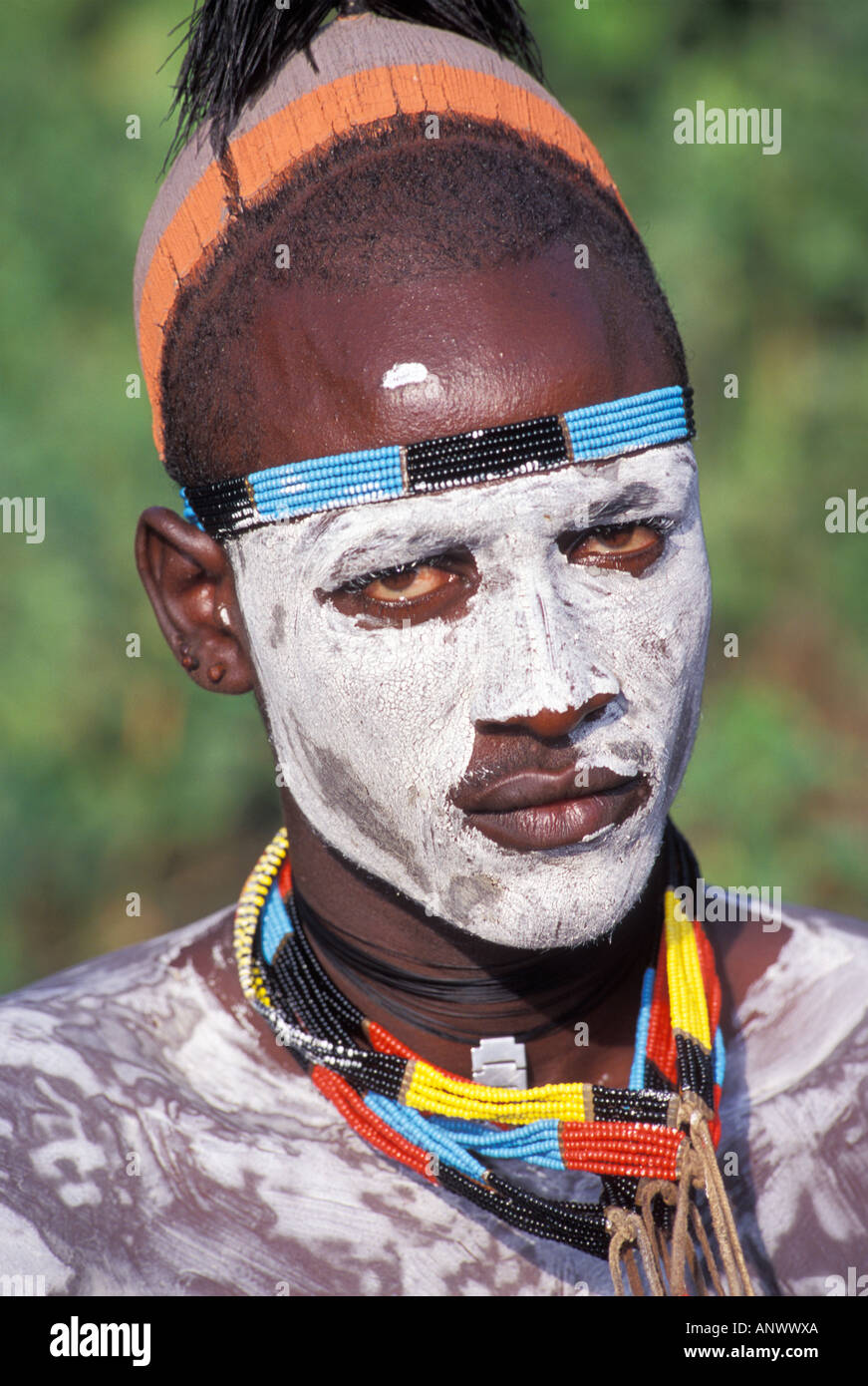 Omo people painting body hi-res stock photography and images - Alamy, image size:871x1390