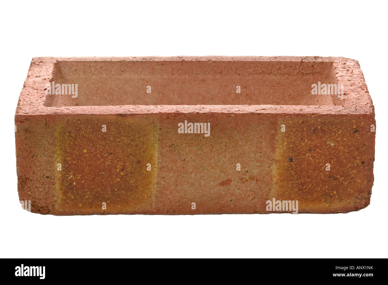 Side of a Red brick on a white background Stock Photo