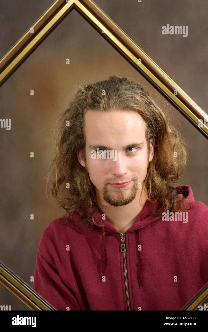 man behind picture frame Stock Photo Alamy