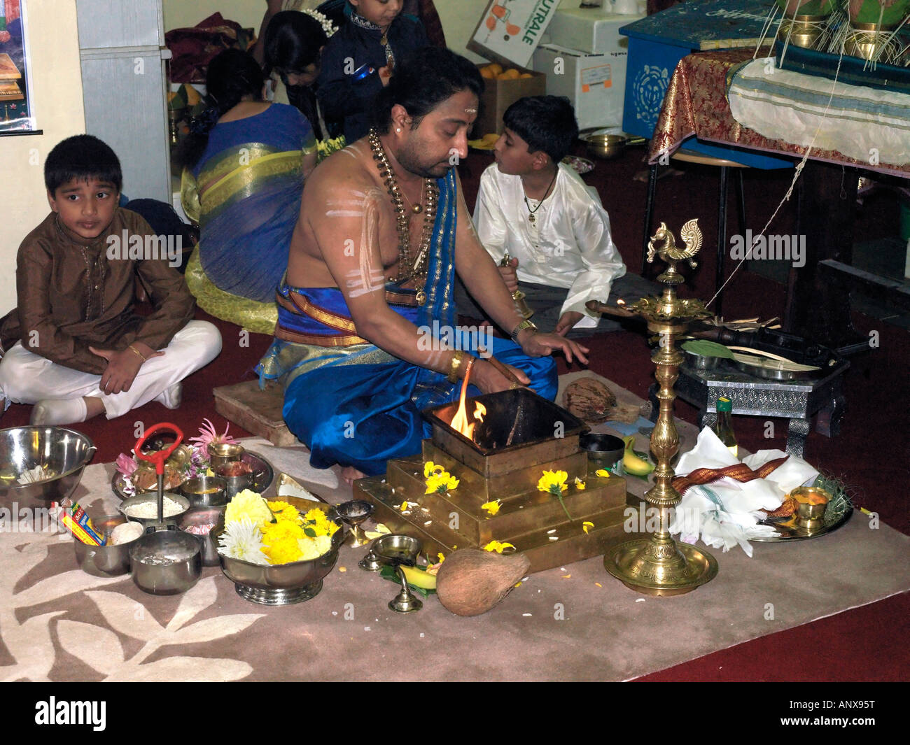 Murugan Temple New Malden Surrey England Priest During Ceremony With Sacred Fire Stock Photo