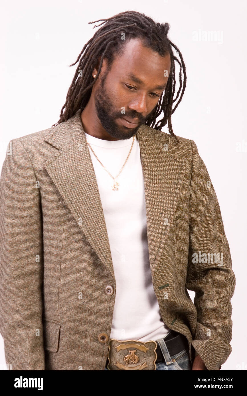 A Black Man With Dreadlock Hair Isolated On A White Background