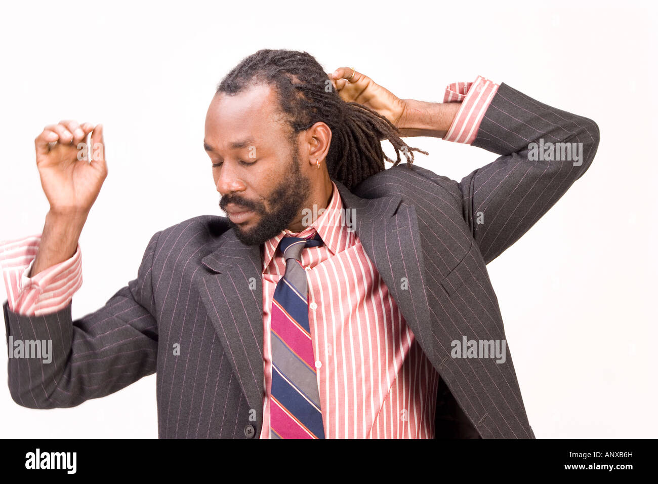 A Black Man With Dreadlock Hair Isolated On A White Background