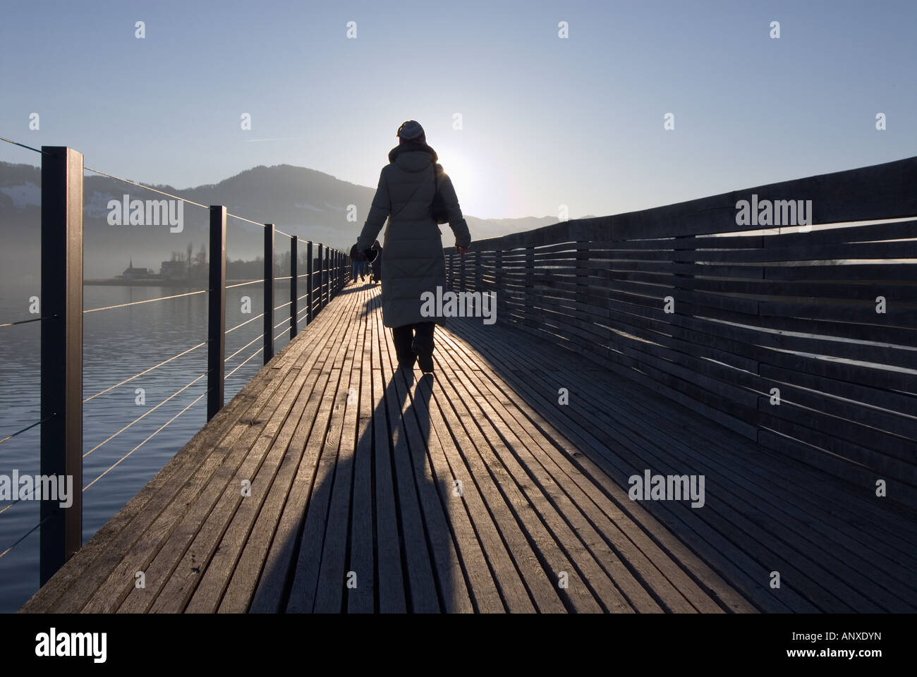Wooden footbridge Hurden-Steg at the Lake Zurich in Rapperswil, Switzerland, part of the Jakobsweg. Stock Photo