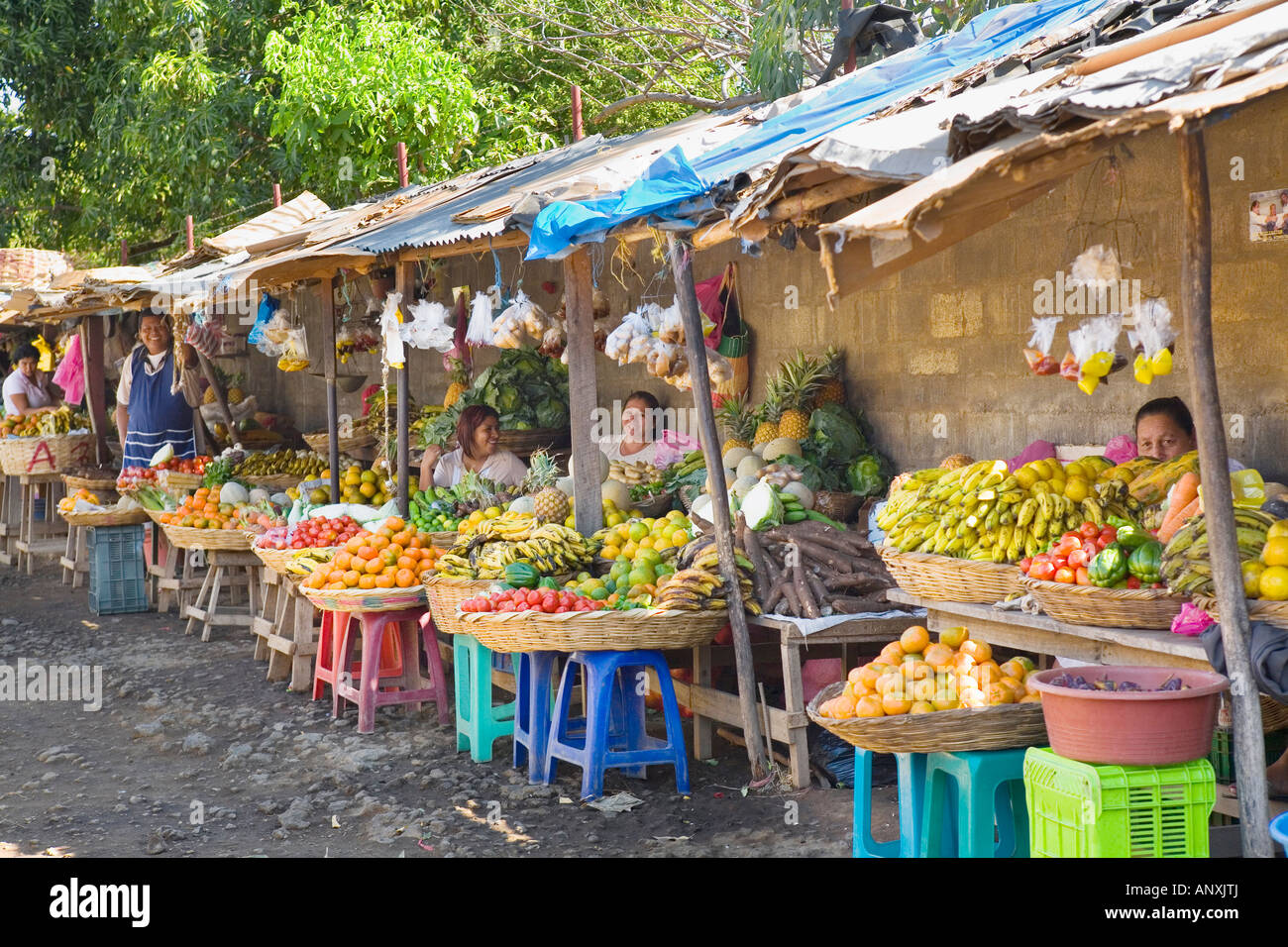 Fruits and vegetables, women vendors at Mercadito Subtiava, Leon, Nicaragua Stock Photo
