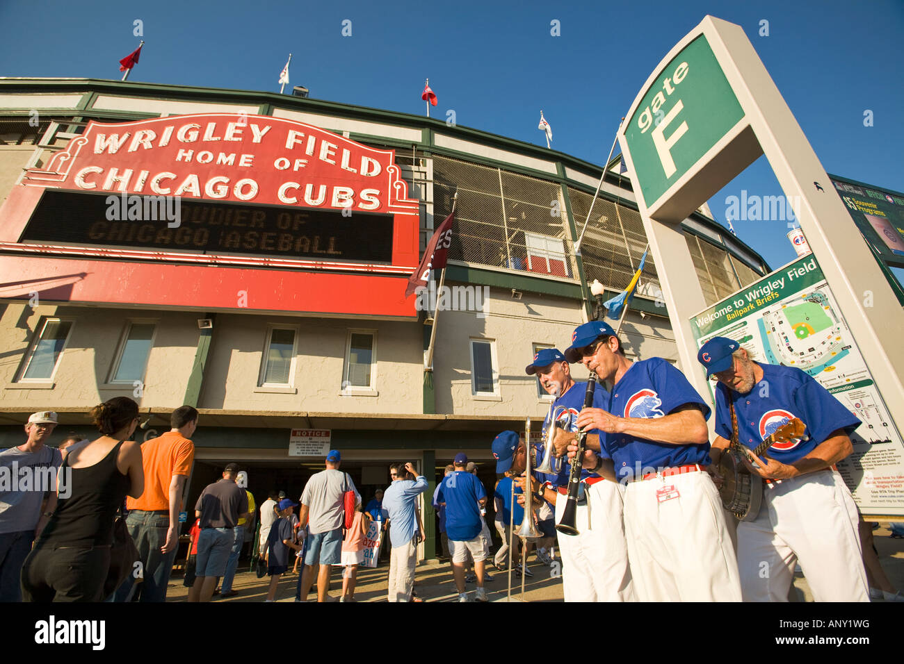 ILLINOIS Chicago Three men play musical instruments outside Wrigley Field stadium for Chicago