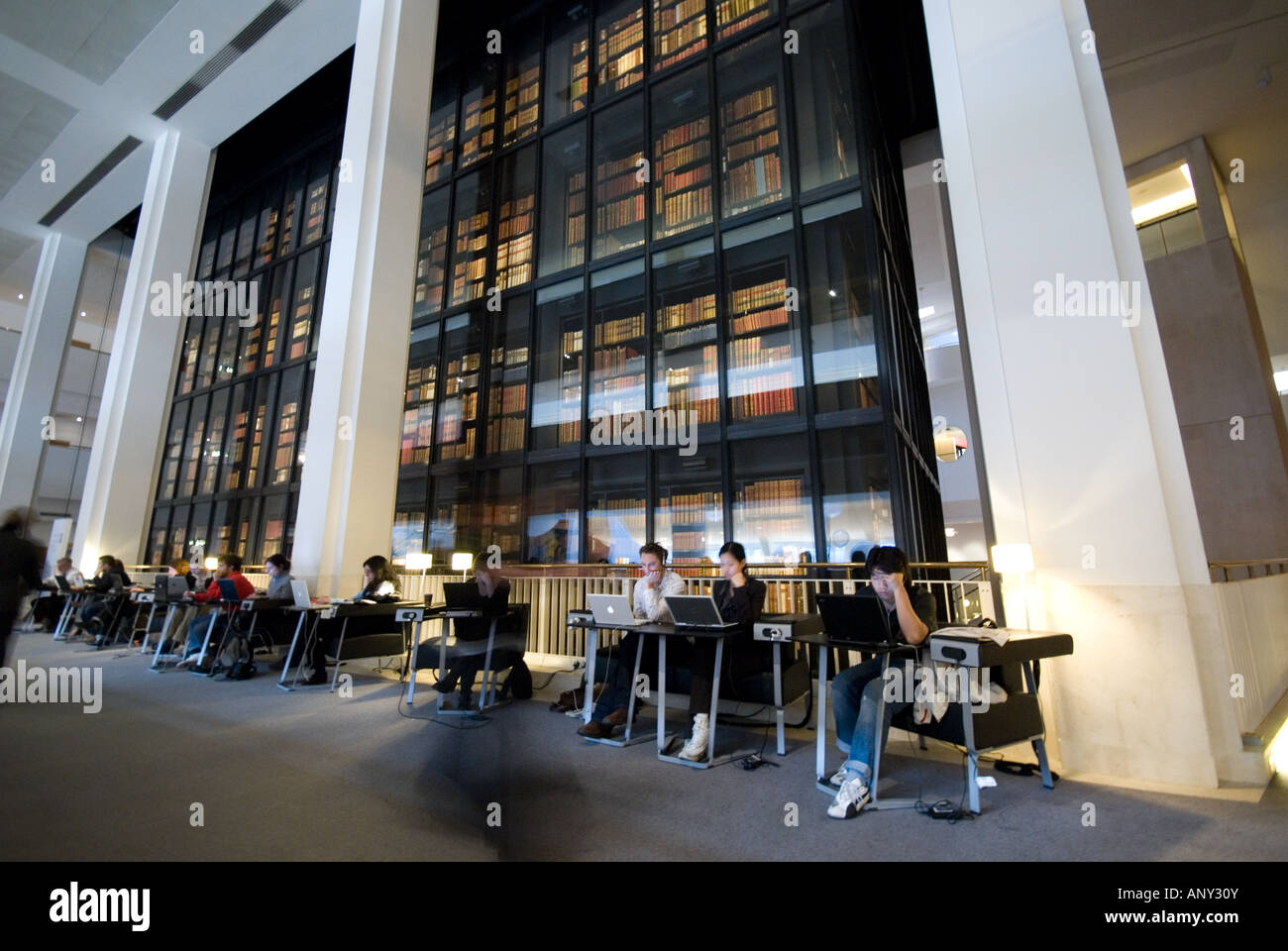 British Library work or study in line sit in confortable black armchairs with notebook London Stock Photo