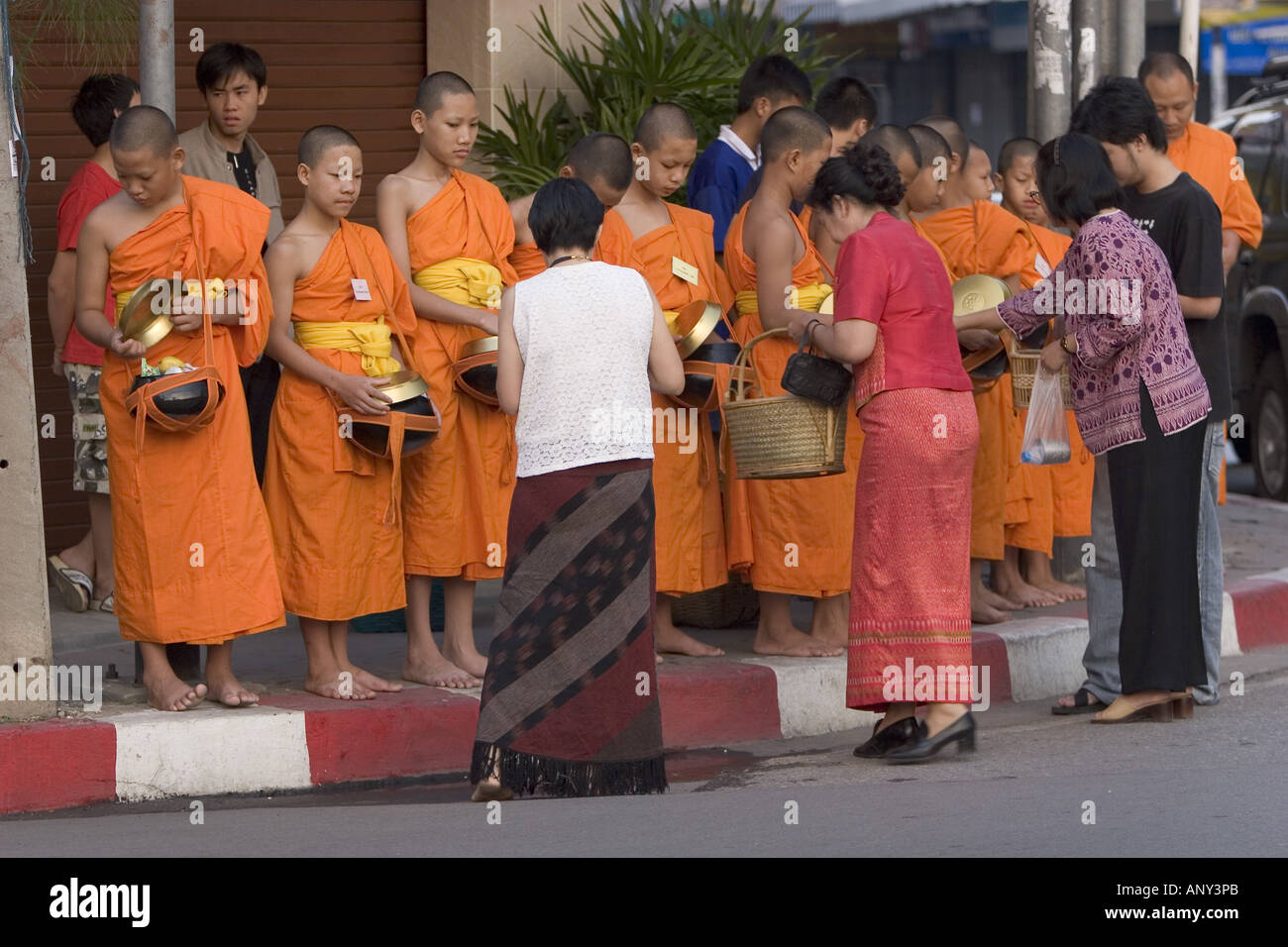 Asia, Thailand, Chiang Mai, Morning offerings to the Buddhist monks Stock Photo
