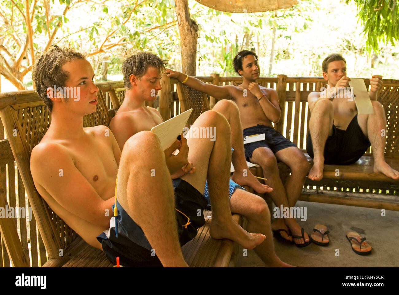 Philippines, Southern Leyte. Coral Cay Conservation Volunteers attending a survey class at the Expedition HQ. Stock Photo