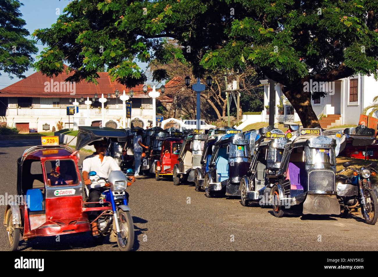 Philippines, Luzon Island, Ilocos Province, Vigan City. Tricycles lined