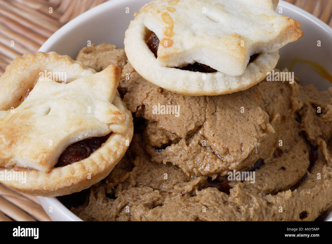 Mince pies on brandy butter for Christmas Stock Photo