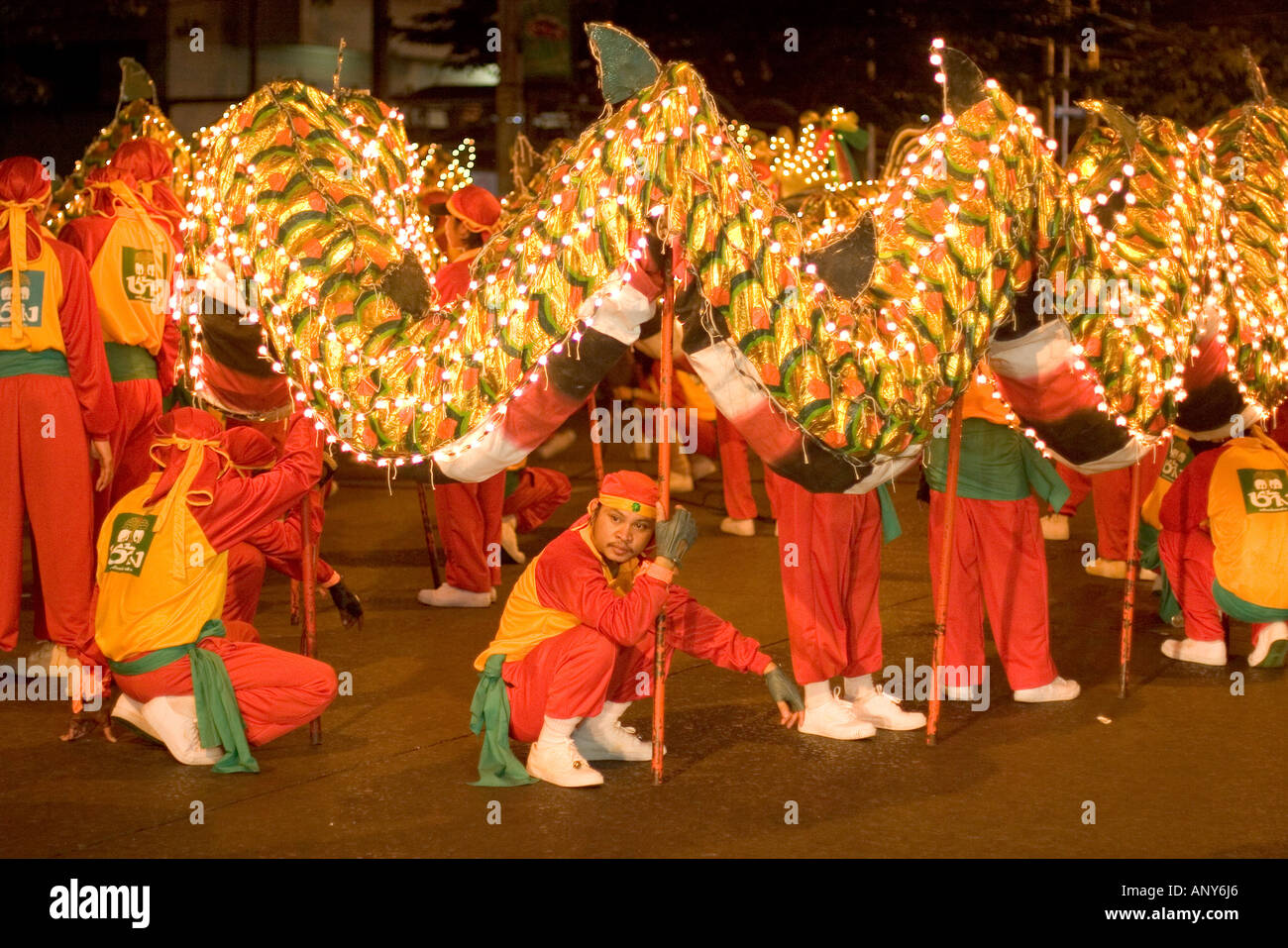 Asia Thailand, Khon Kaen, Dragon performers at the Chinese thanks giving  festival. Stock Photo