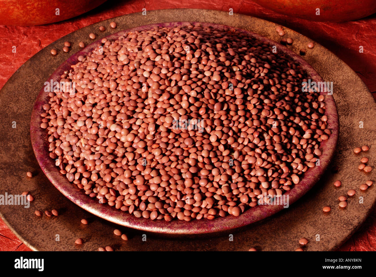 BOWL OF BROWN LENTILS Stock Photo