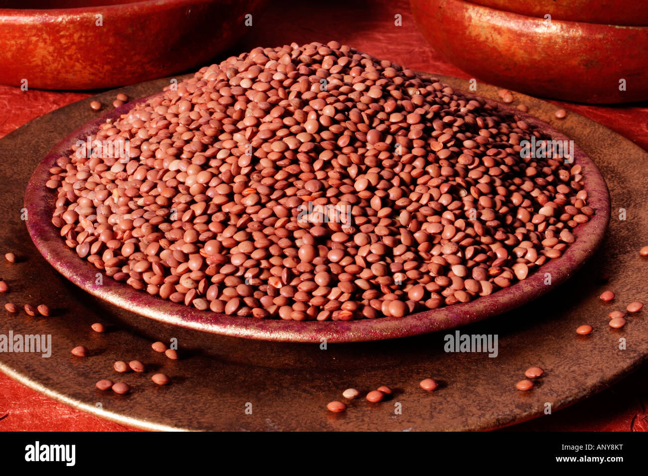 BOWL OF BROWN LENTILS Stock Photo