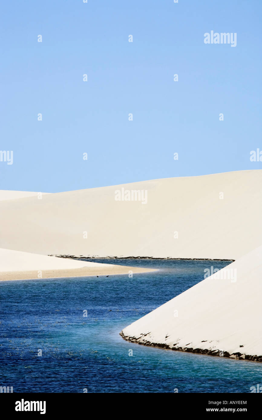 view of lagoa azul in desert white sand dunes of the Lencois Maranheses National Park in brazil Stock Photo