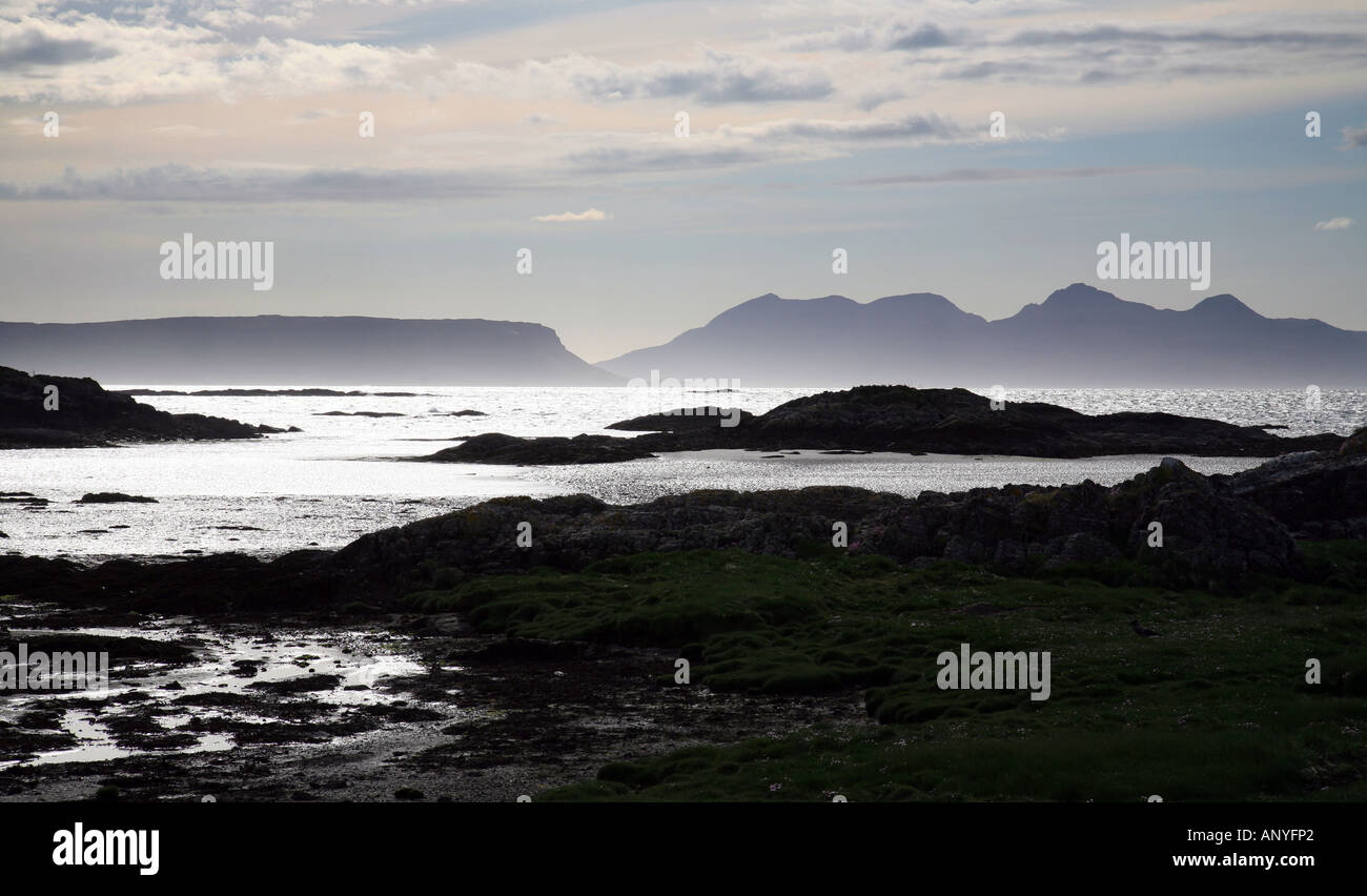 Scotland landscape - Arisaig, Scotland, looking out over the sea to the Western Isles of Rum and Eigg, misty evening light Stock Photo