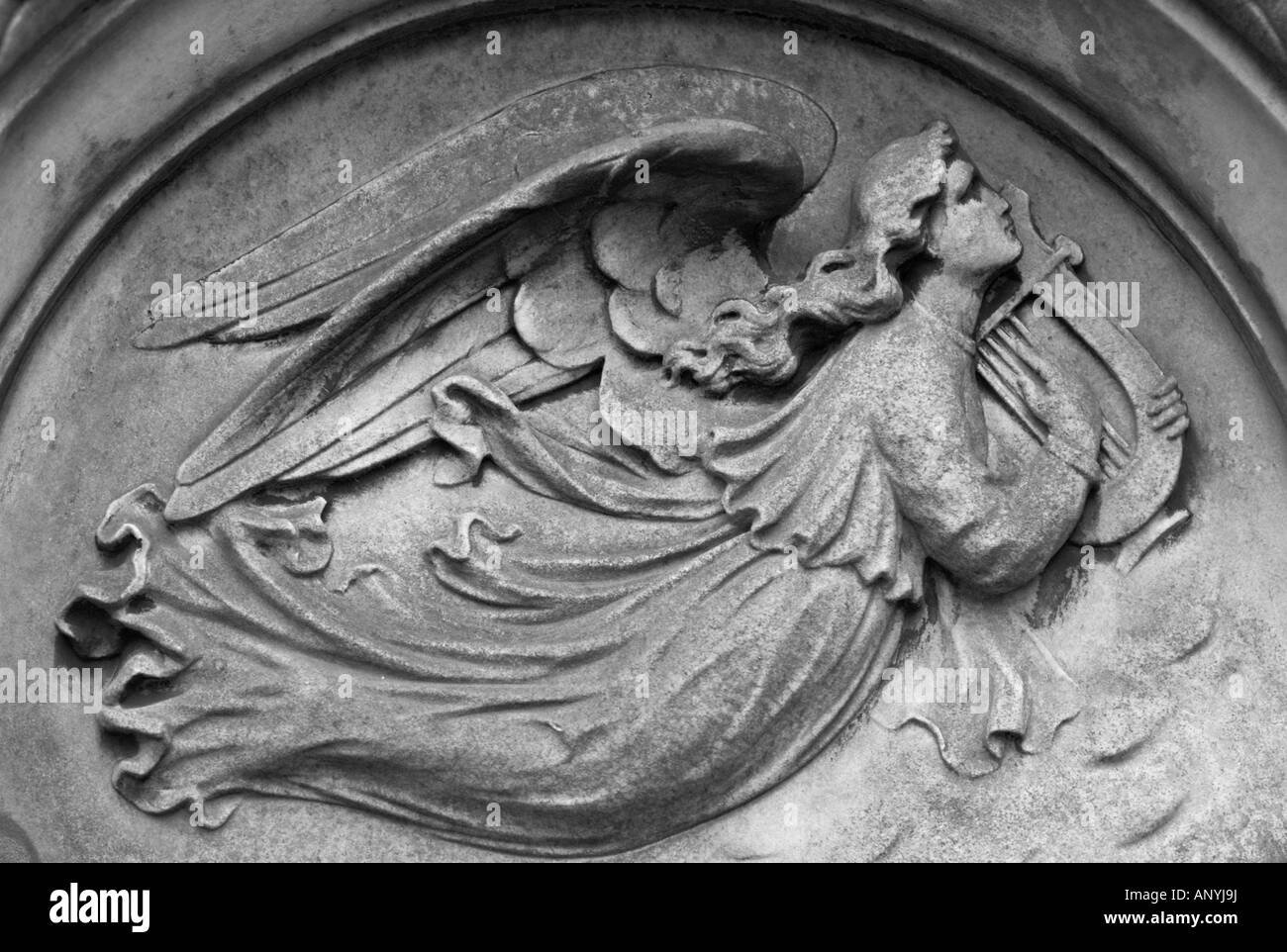 Grave detail of angel at Arnos Vale Cemetery Bristol England Stock Photo
