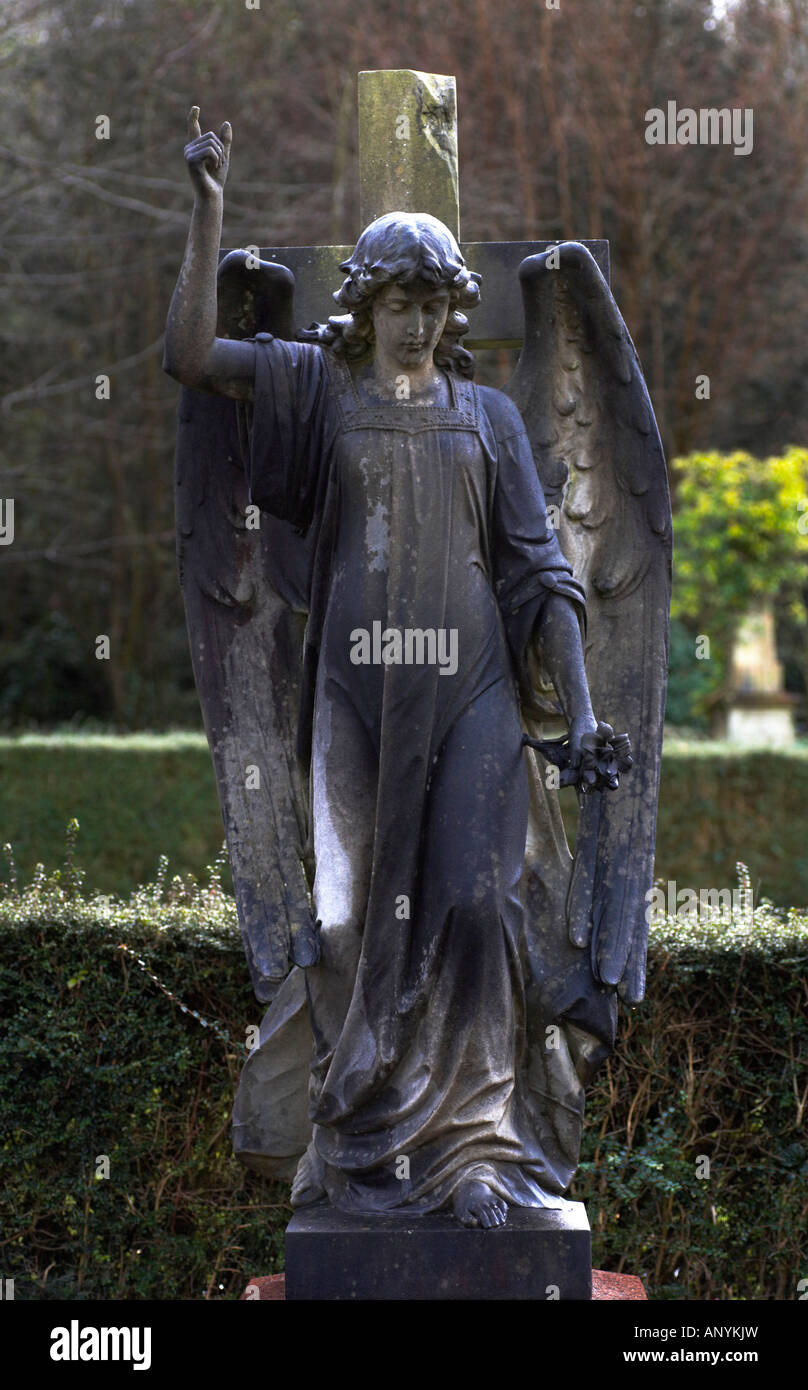 Angel statue over a grave at Arnos Vale Cemetery Bristol England Stock Photo