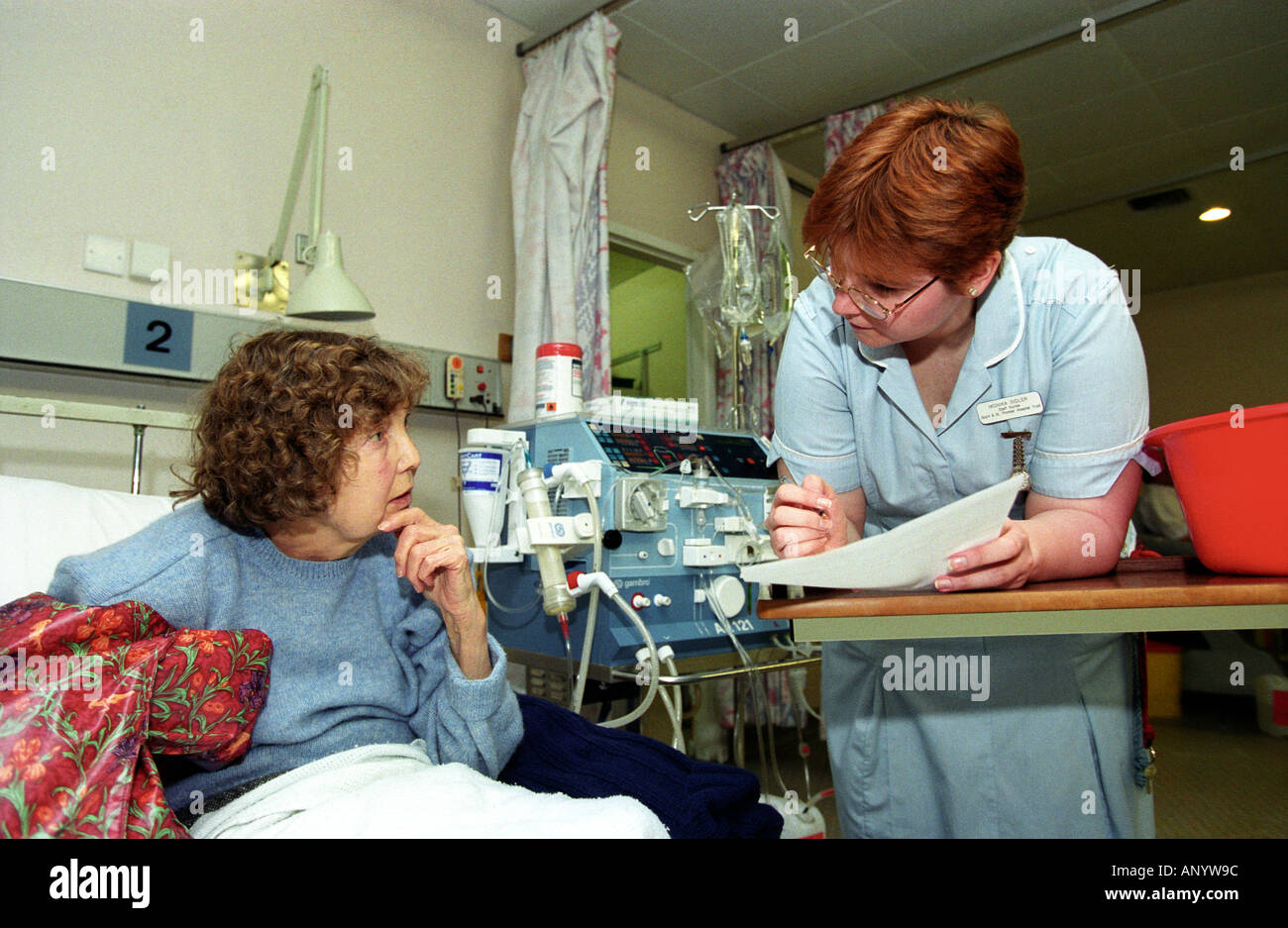 Nurse with elderly patient on geriatric ward, Guys Hospital, London, UK. Stock Photo